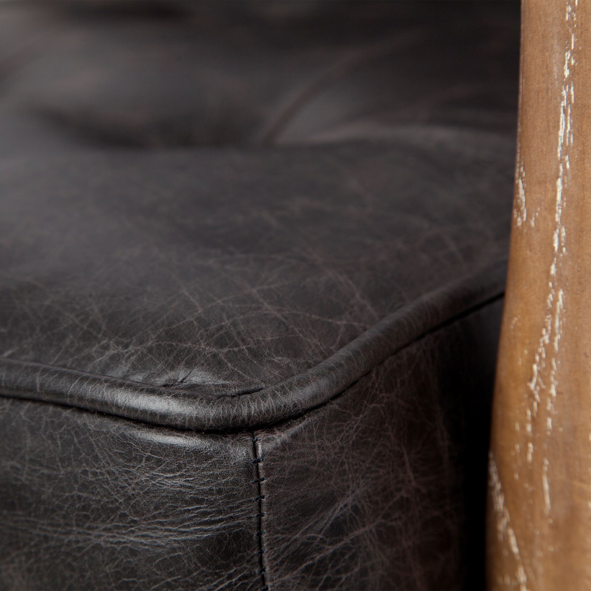 phineas black leather w/ brown wooden frame accent chair