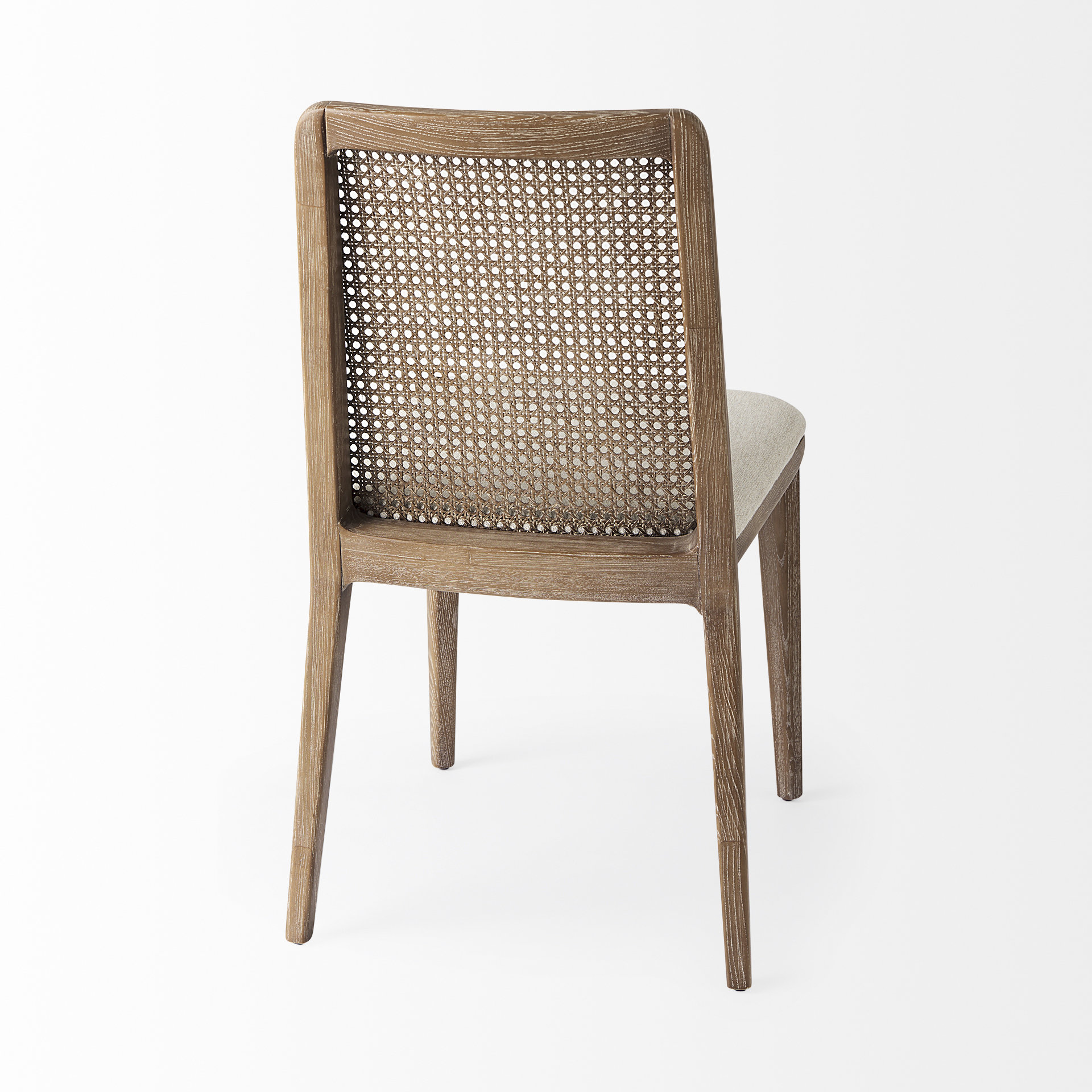clara light brown wood w/ cream fabric seat and cane back armless dining chair