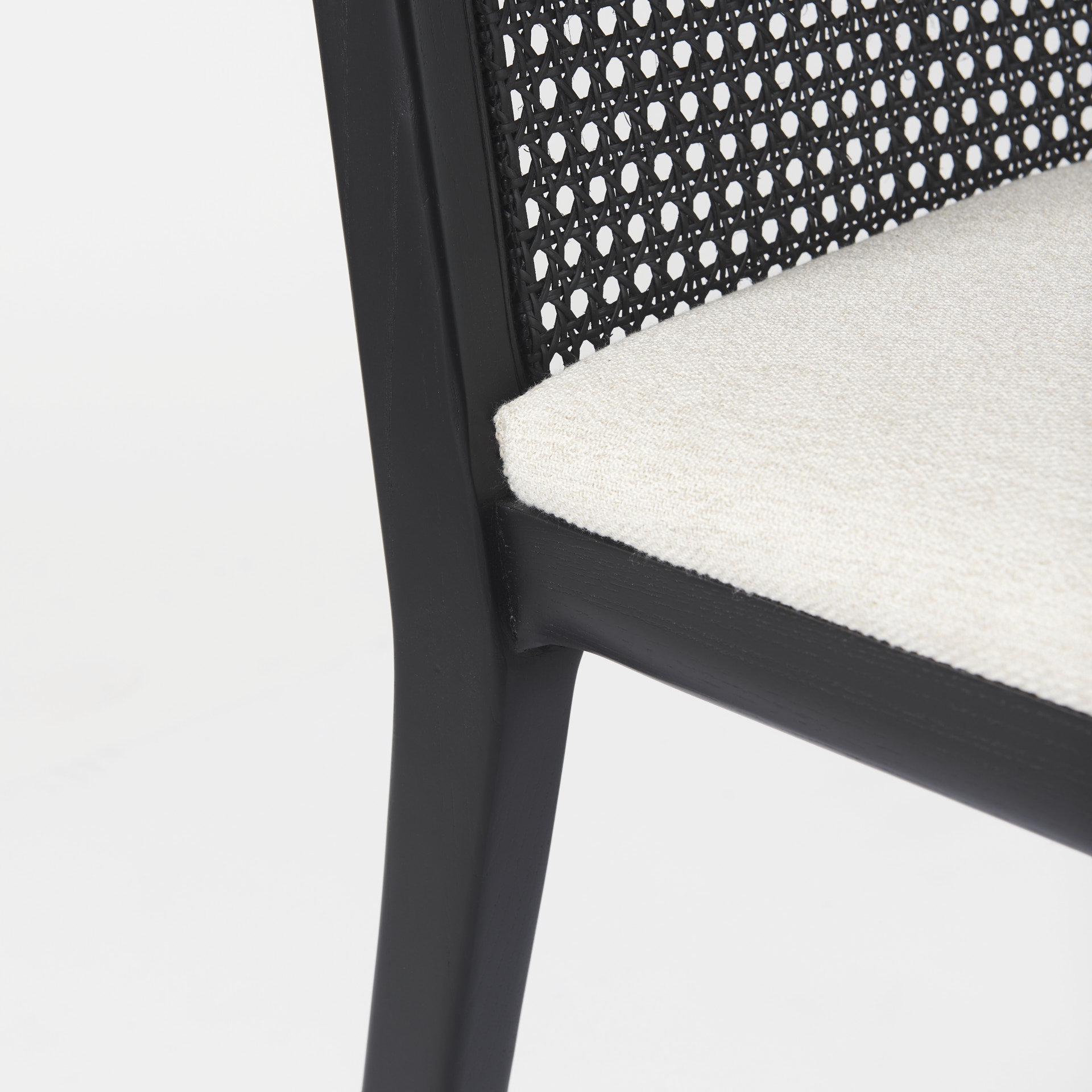 clara black wood w/ cream fabric seat and cane back armless dining chair