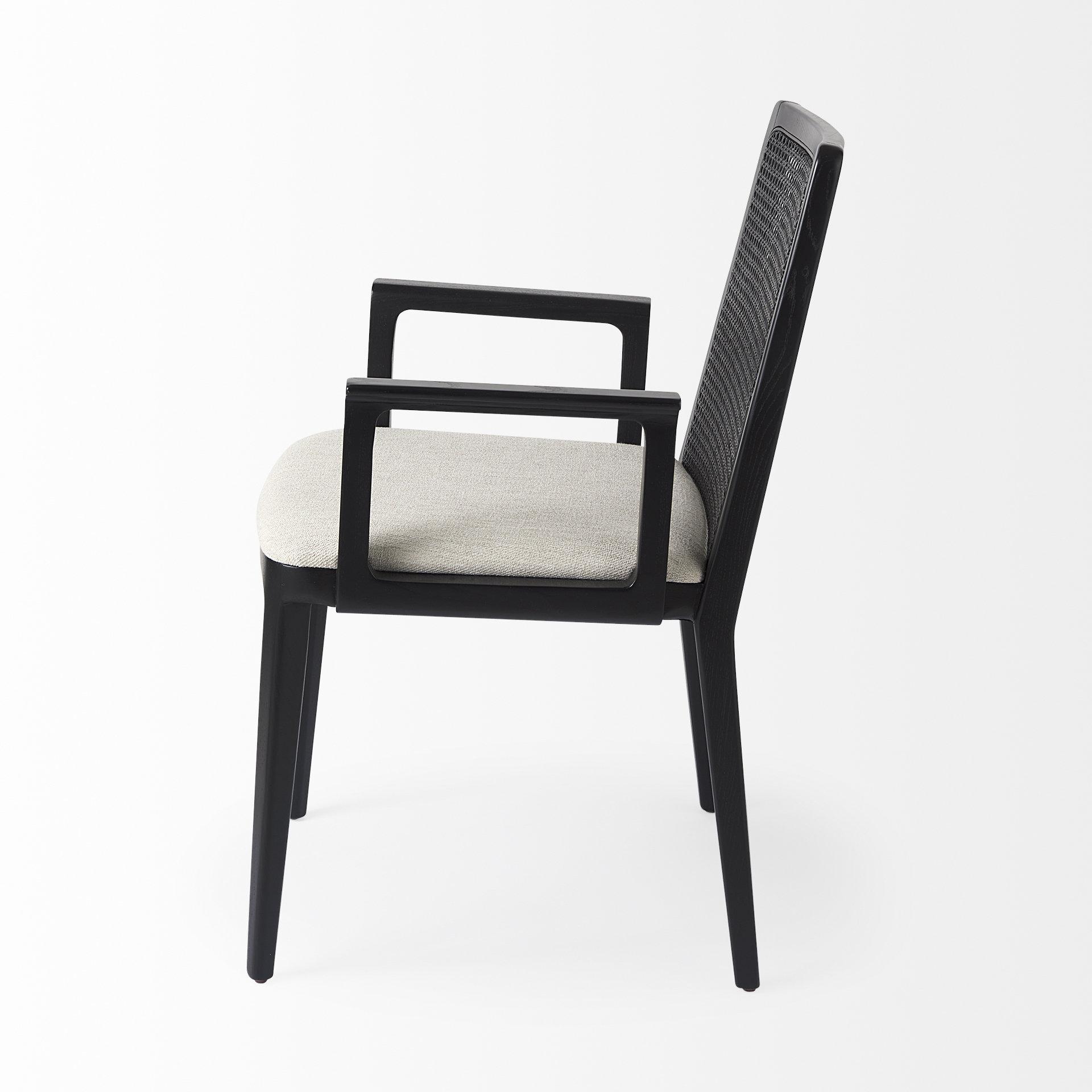 clara black wood w/ cream fabric seat and cane back dining chair