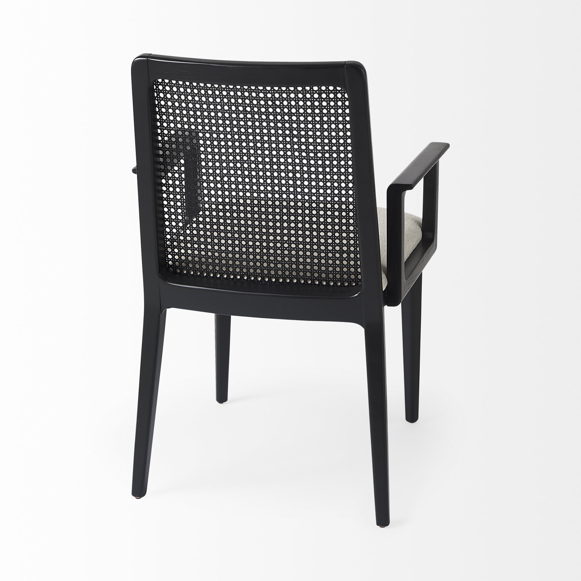 clara black wood w/ cream fabric seat and cane back dining chair