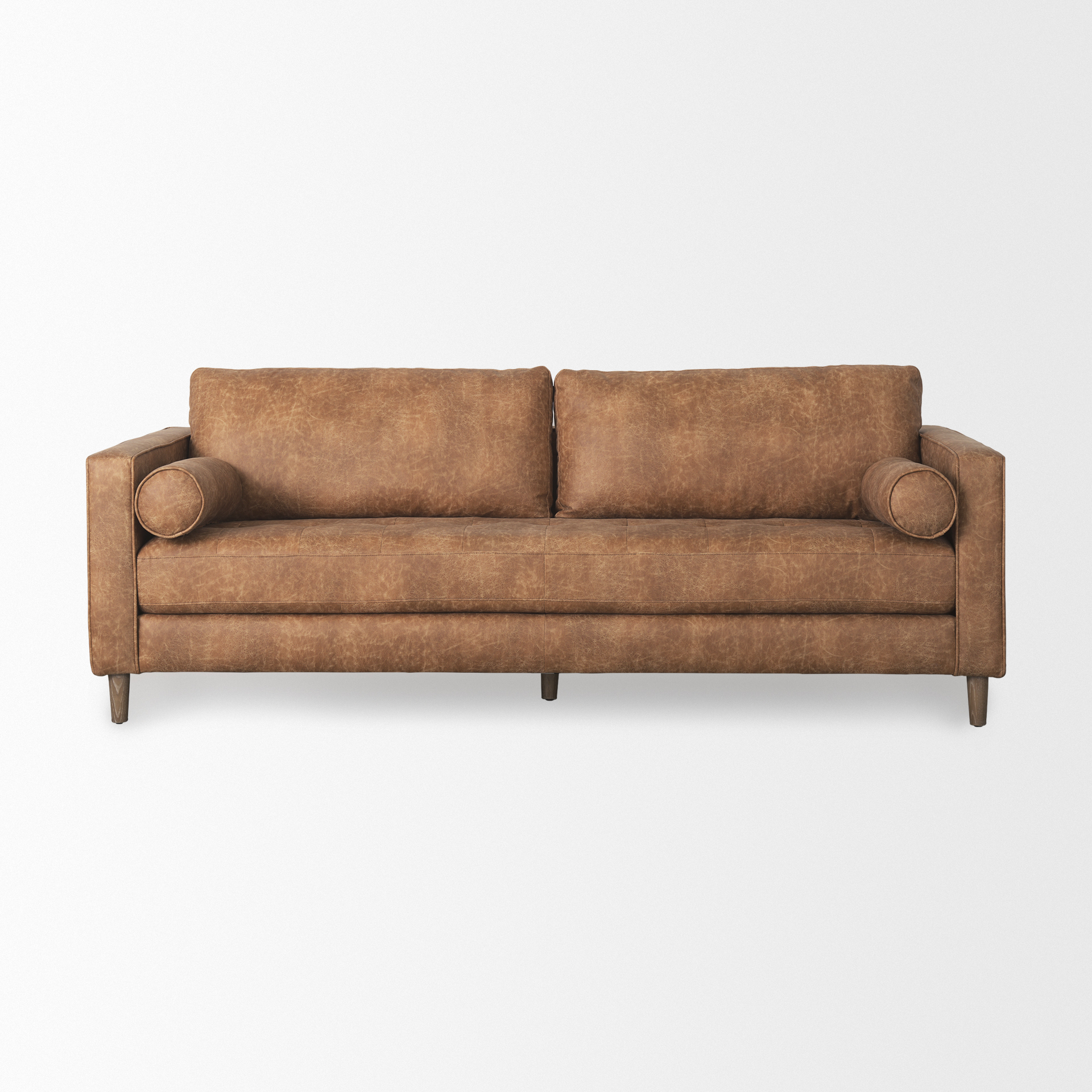 loretta 88.0l x 36.2w x 33.9h cognac brown faux leather three seater sofa with two bolster cushions