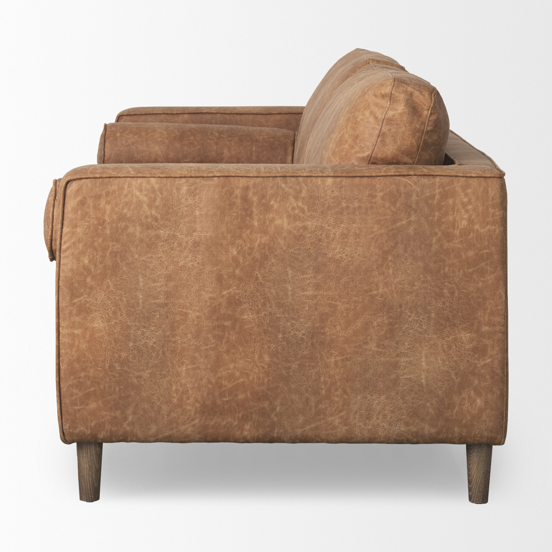 loretta 88.0l x 36.2w x 33.9h cognac brown faux leather three seater sofa with two bolster cushions