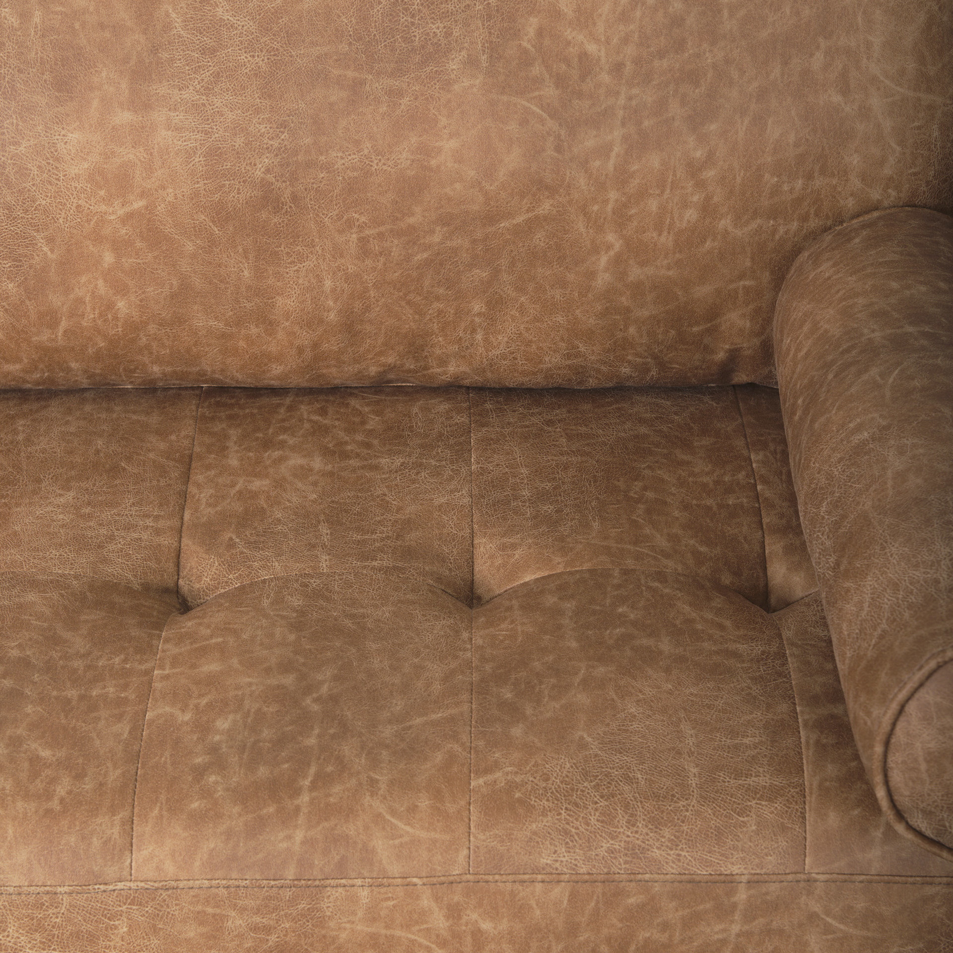 loretta 88.0l x 36.2w x 33.9h cognac brown faux leather three seater sofa with two bolster cushions