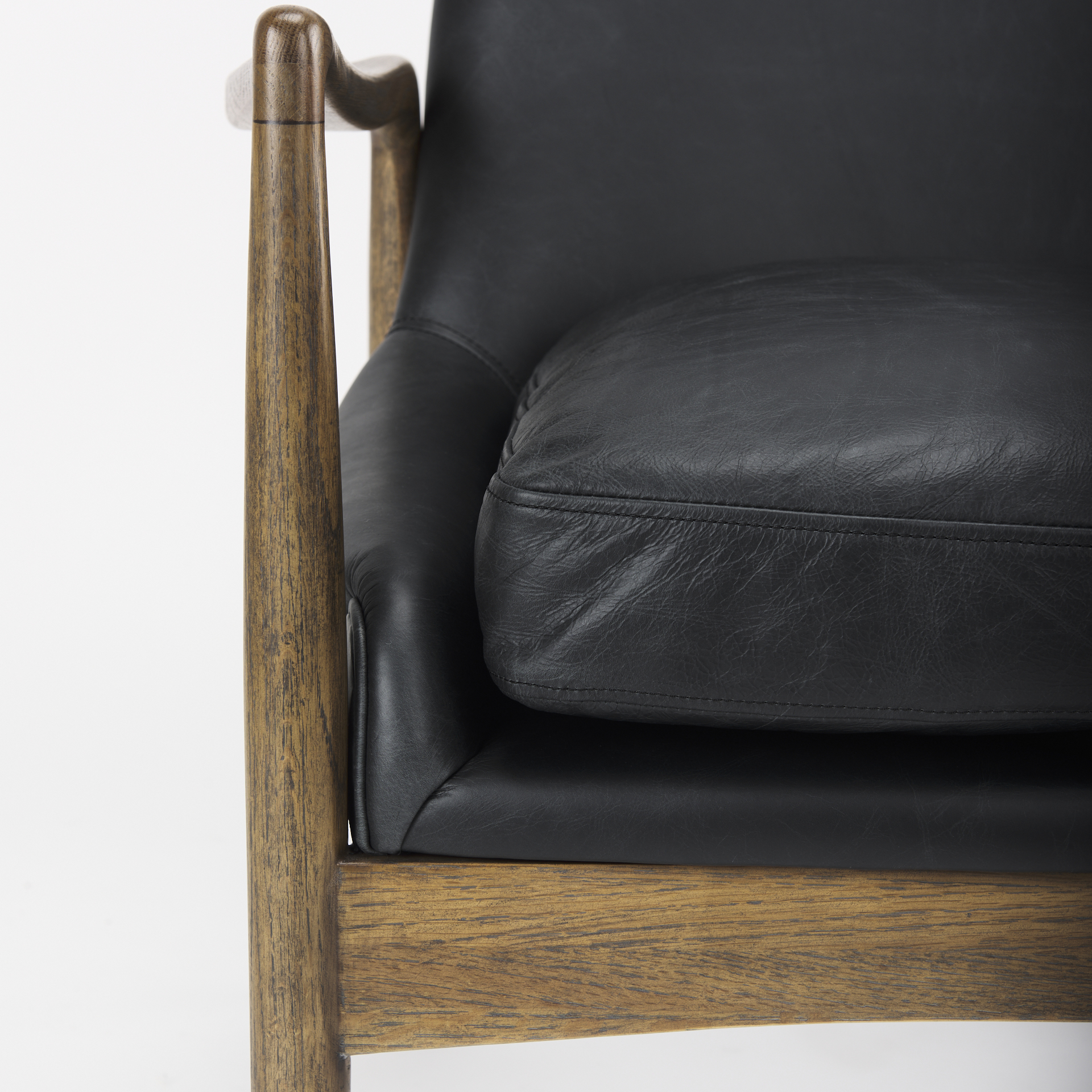westan black genuine leather w/medium brown wood accent chair