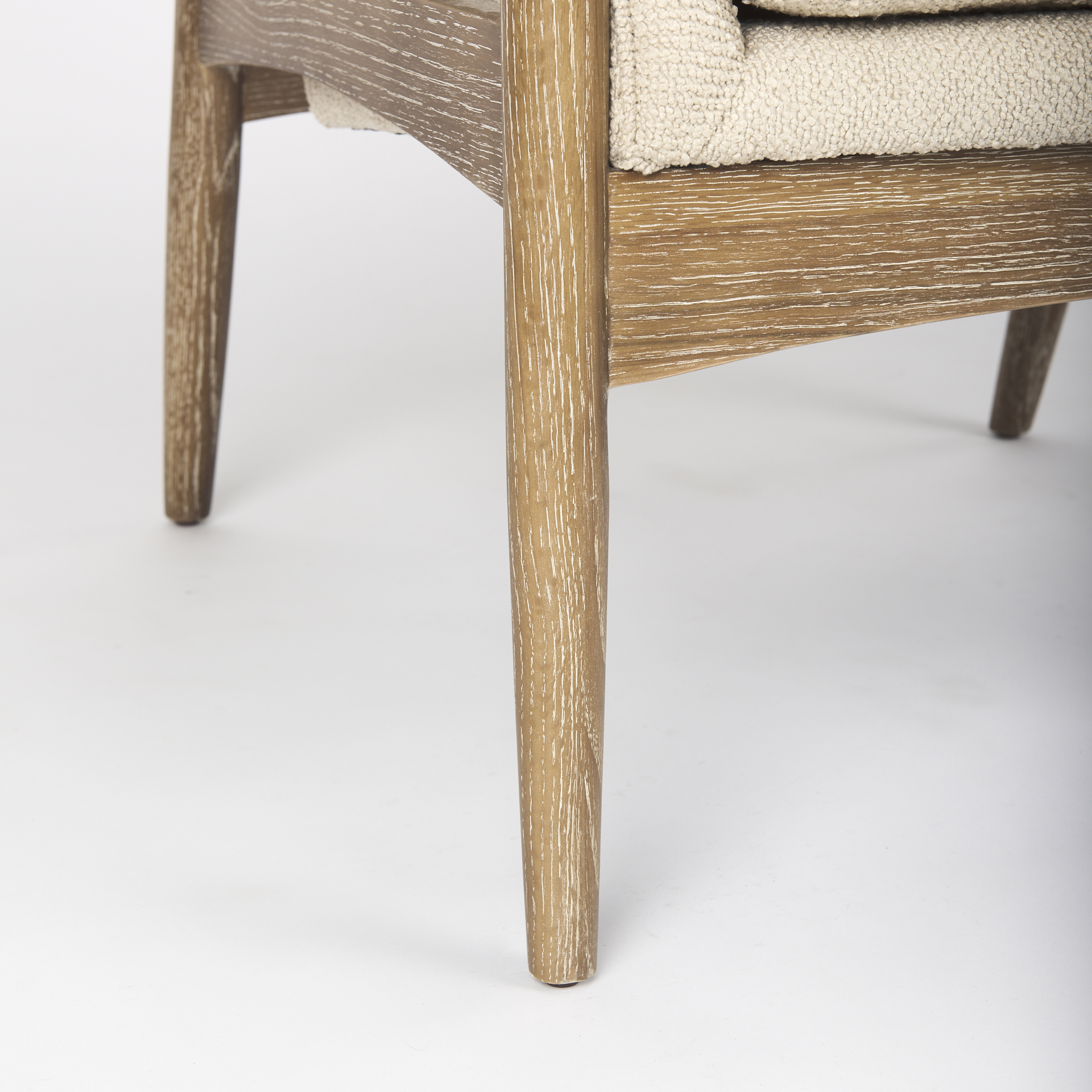 westan cream boucle fabric w/light brown wood accent chair