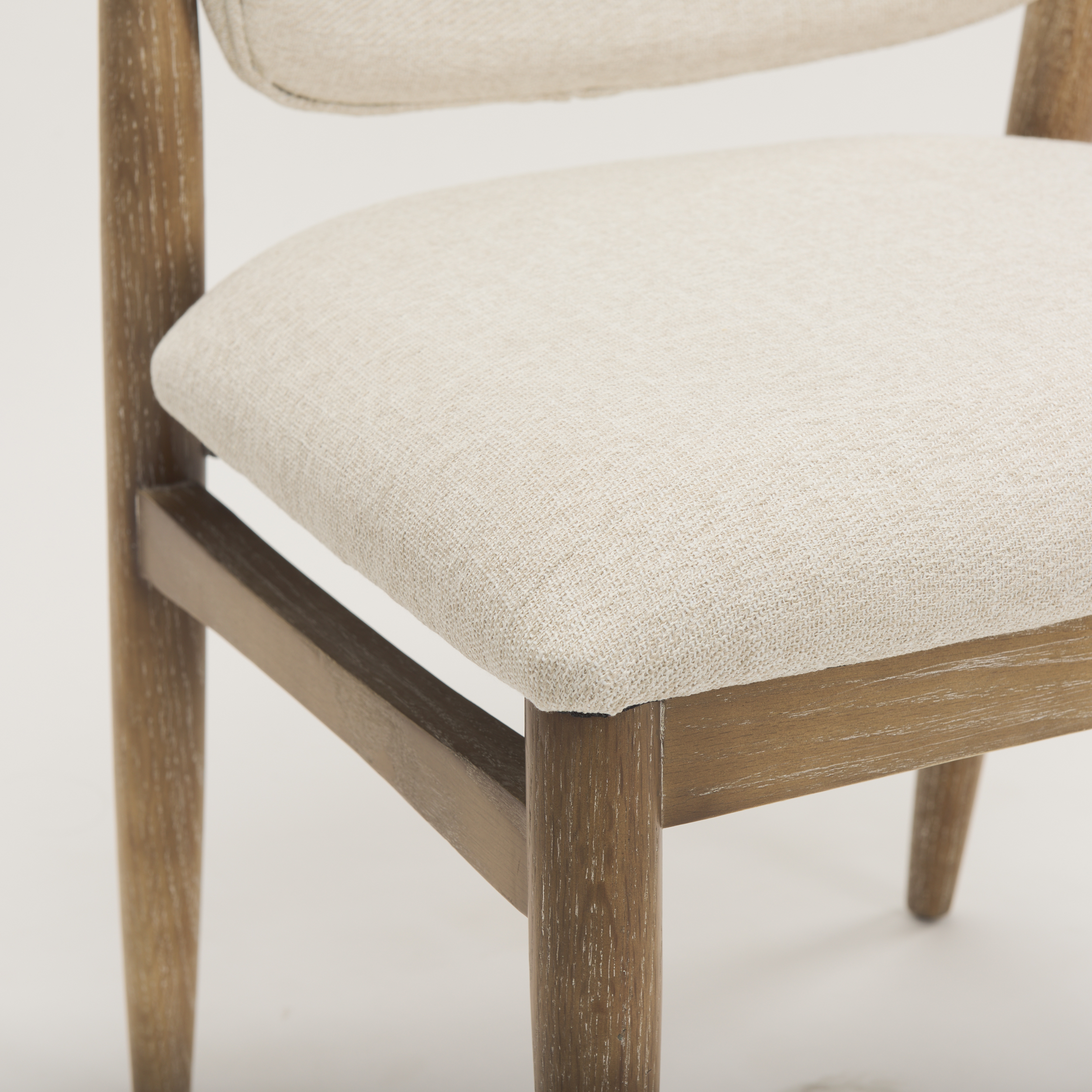 cline cream fabric upholstered and light brown wood dining chair