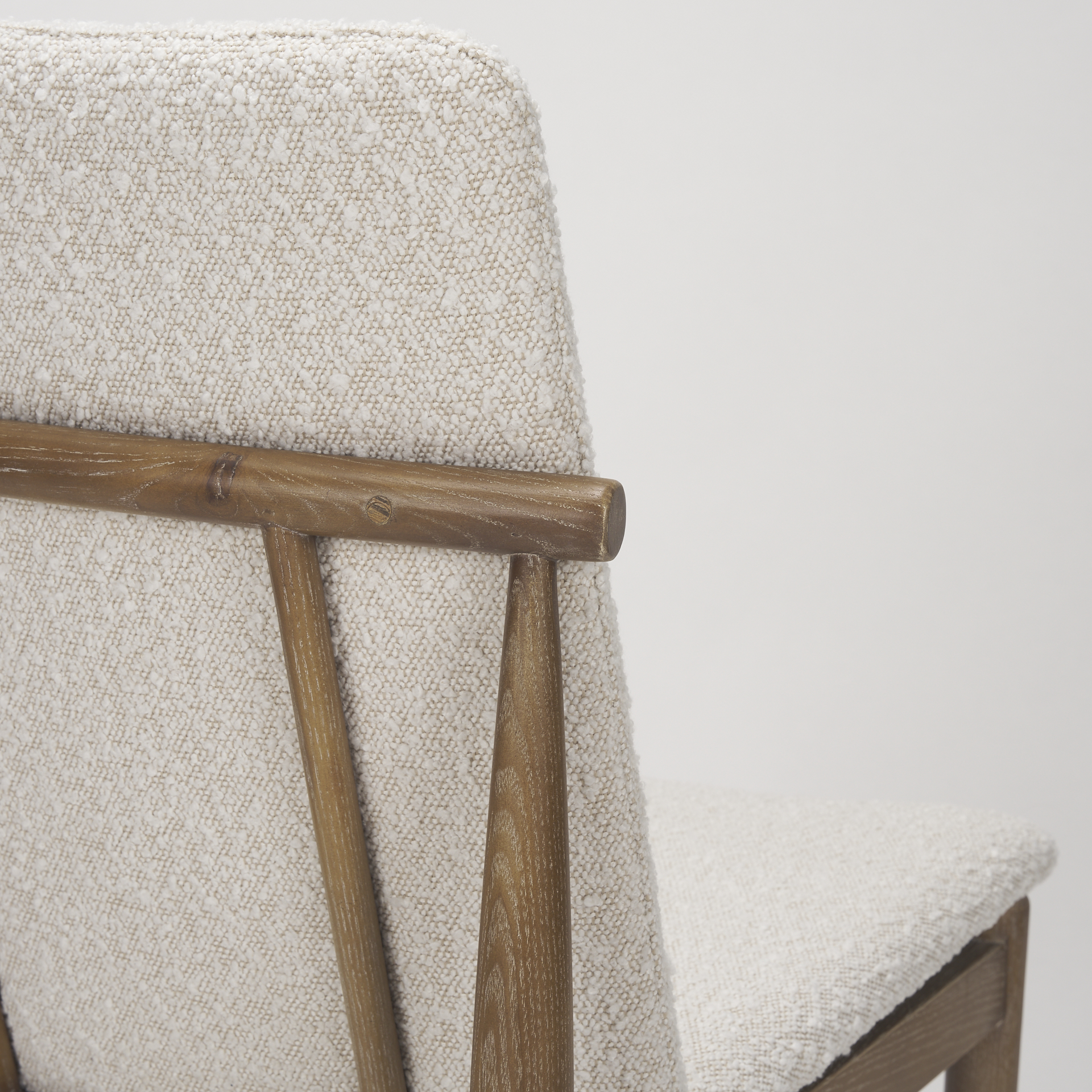 cavett cream boucle upholstered seat w/light brown wood frame dining chair