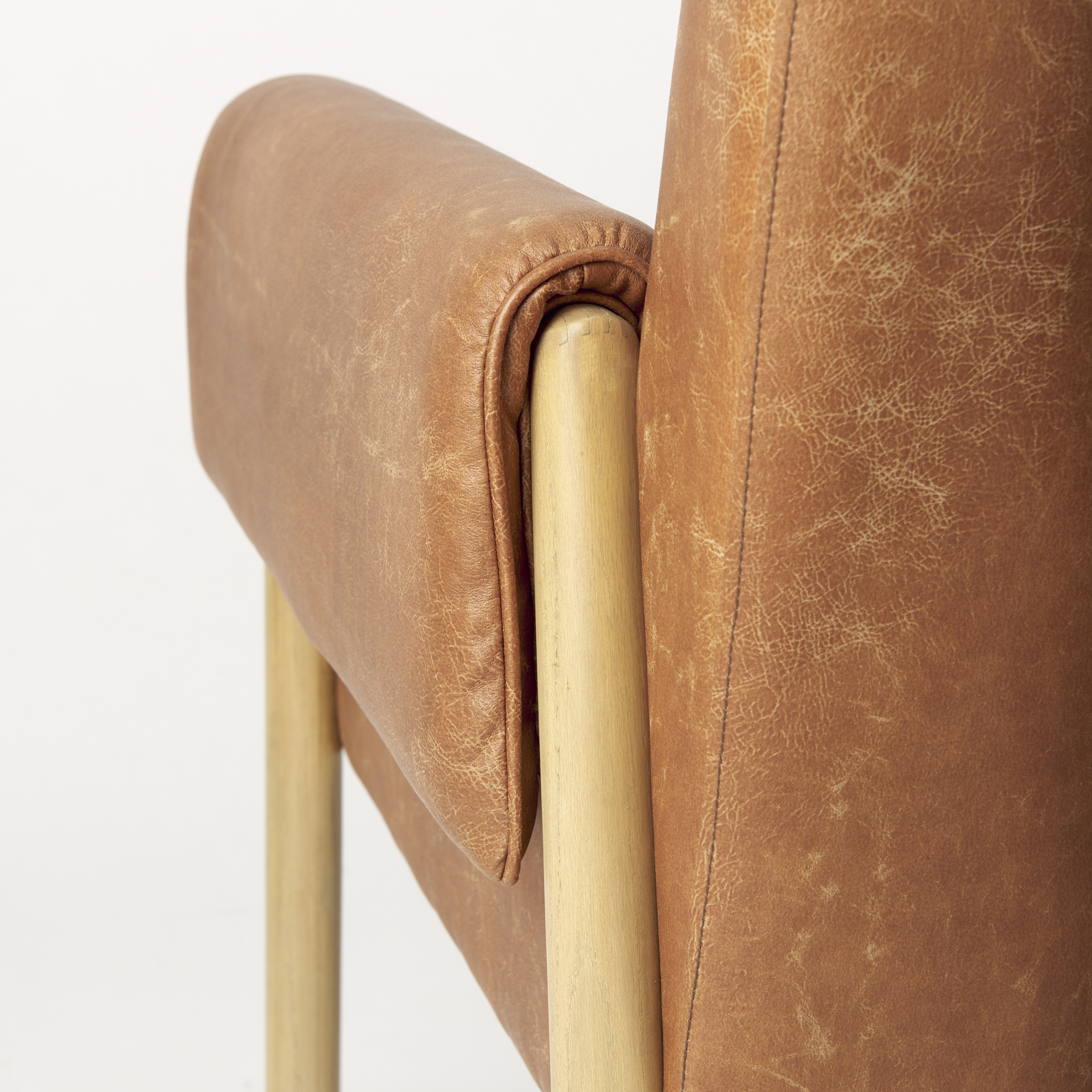 ashton brown faux leather w/ light wood accent chair