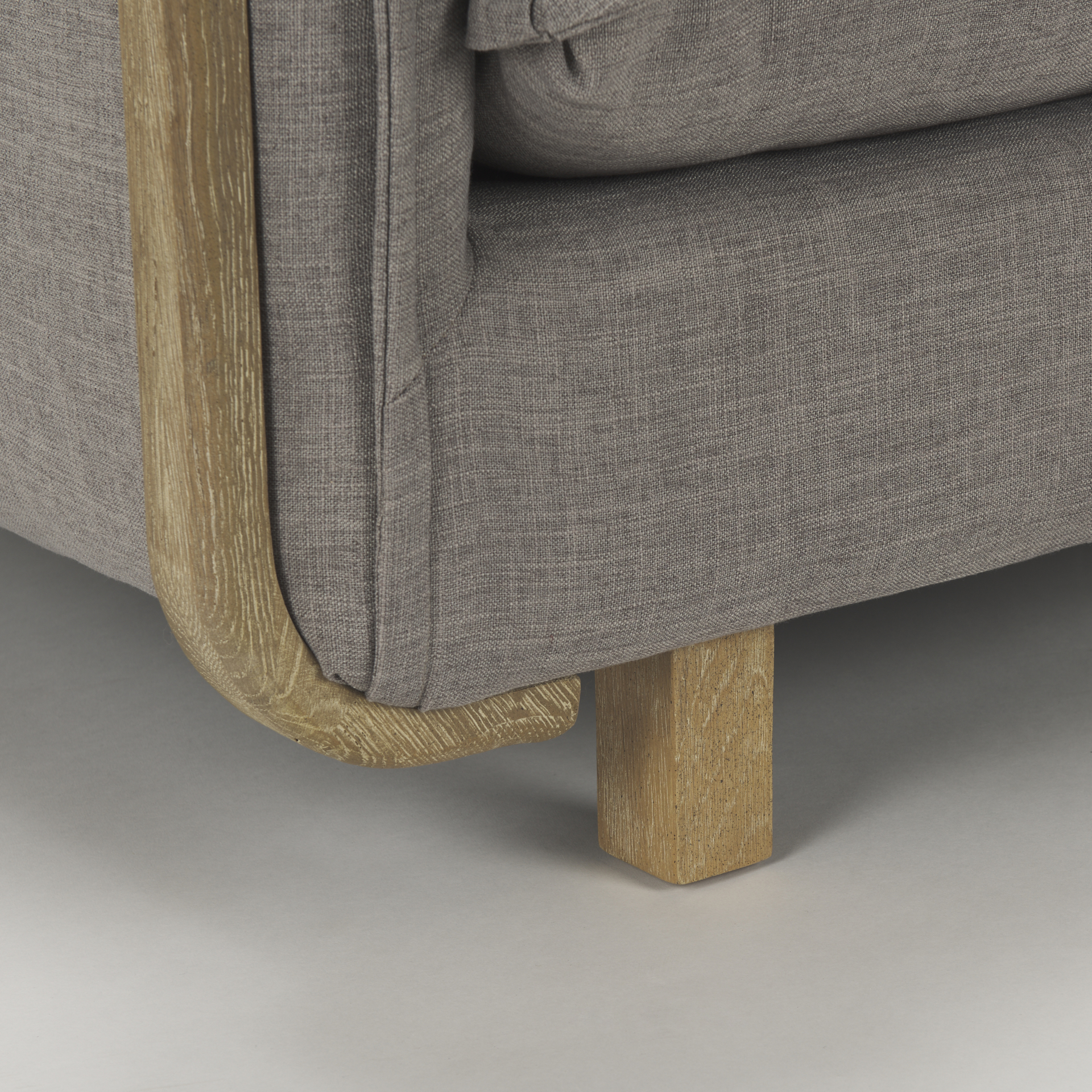 roy ii flint gray upholstered and brown wood frame arm chair