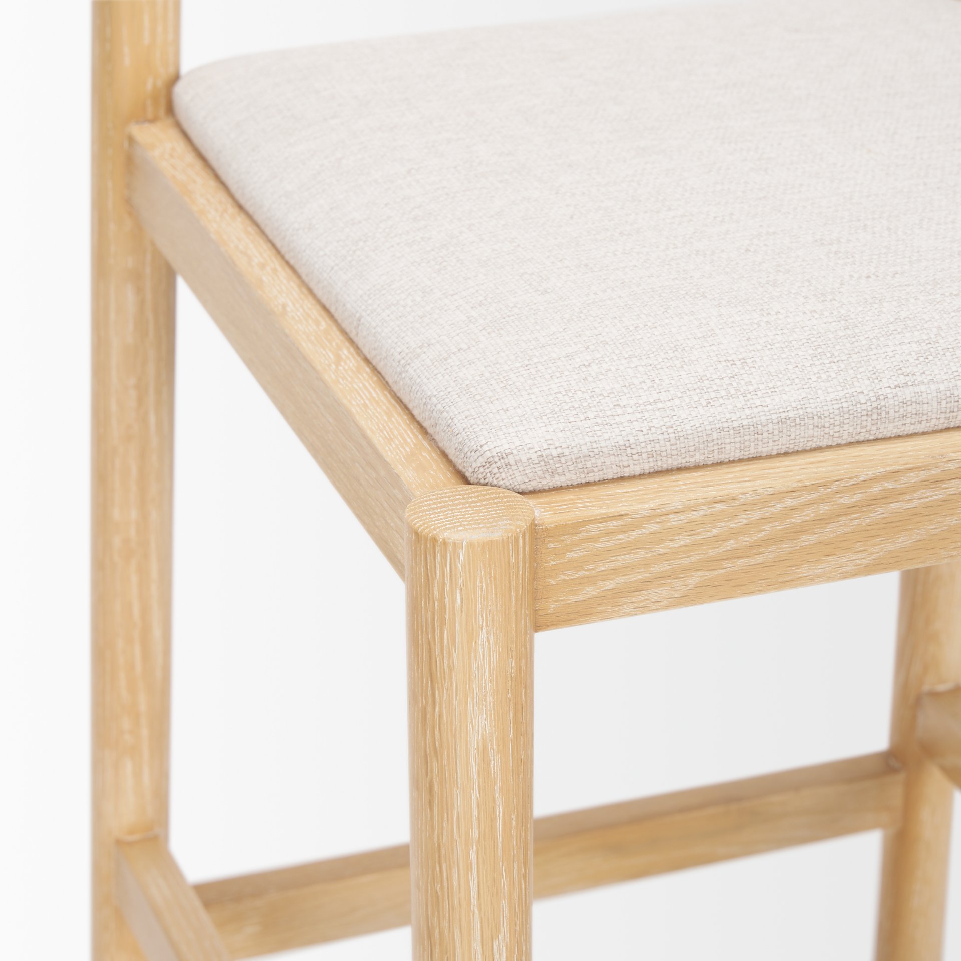 sam counter stool w/ light brown wood frame and beige upholstered seat