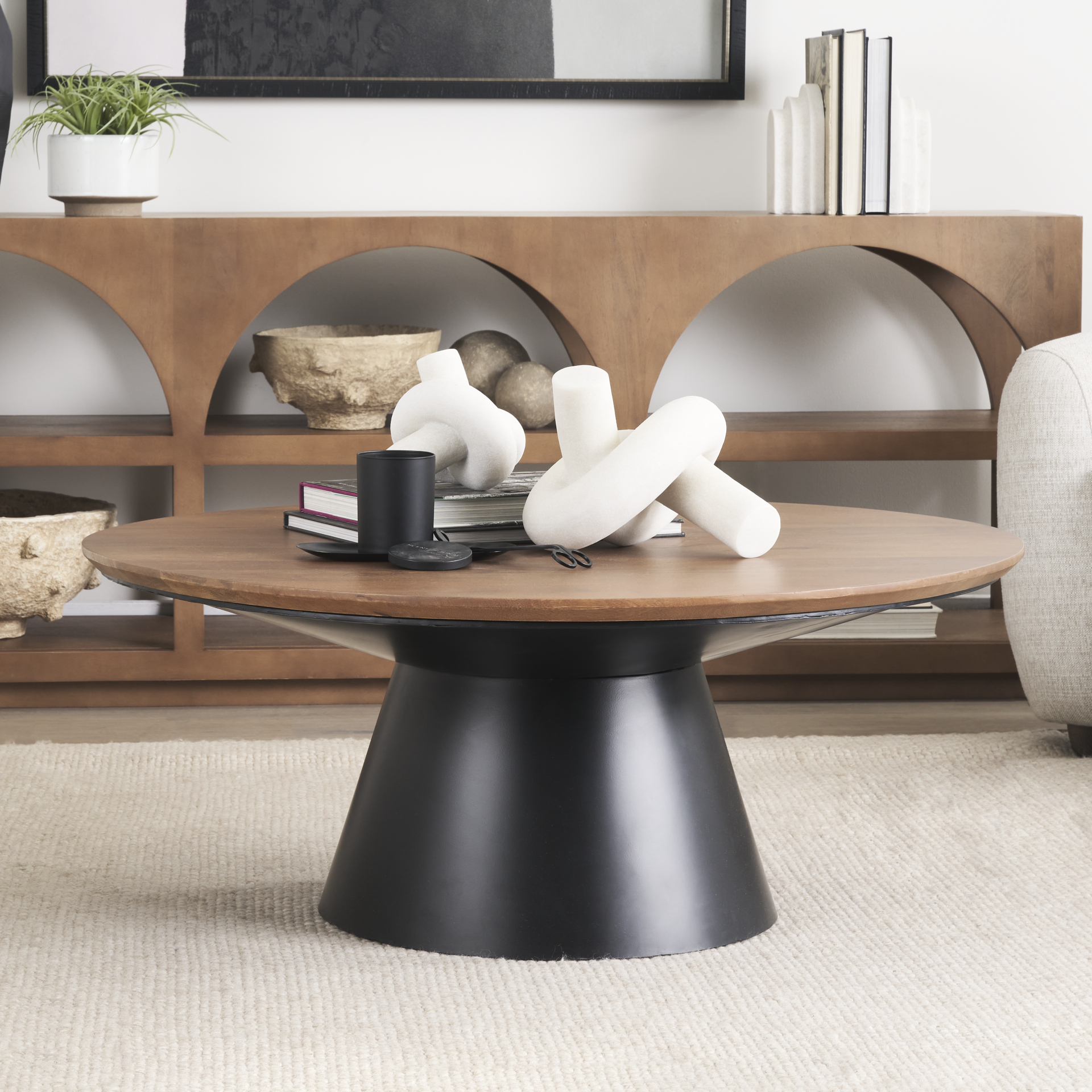 mitchell 40.0l x 40.0w x 16.0h black metal pedestal base with brown wood top coffee table