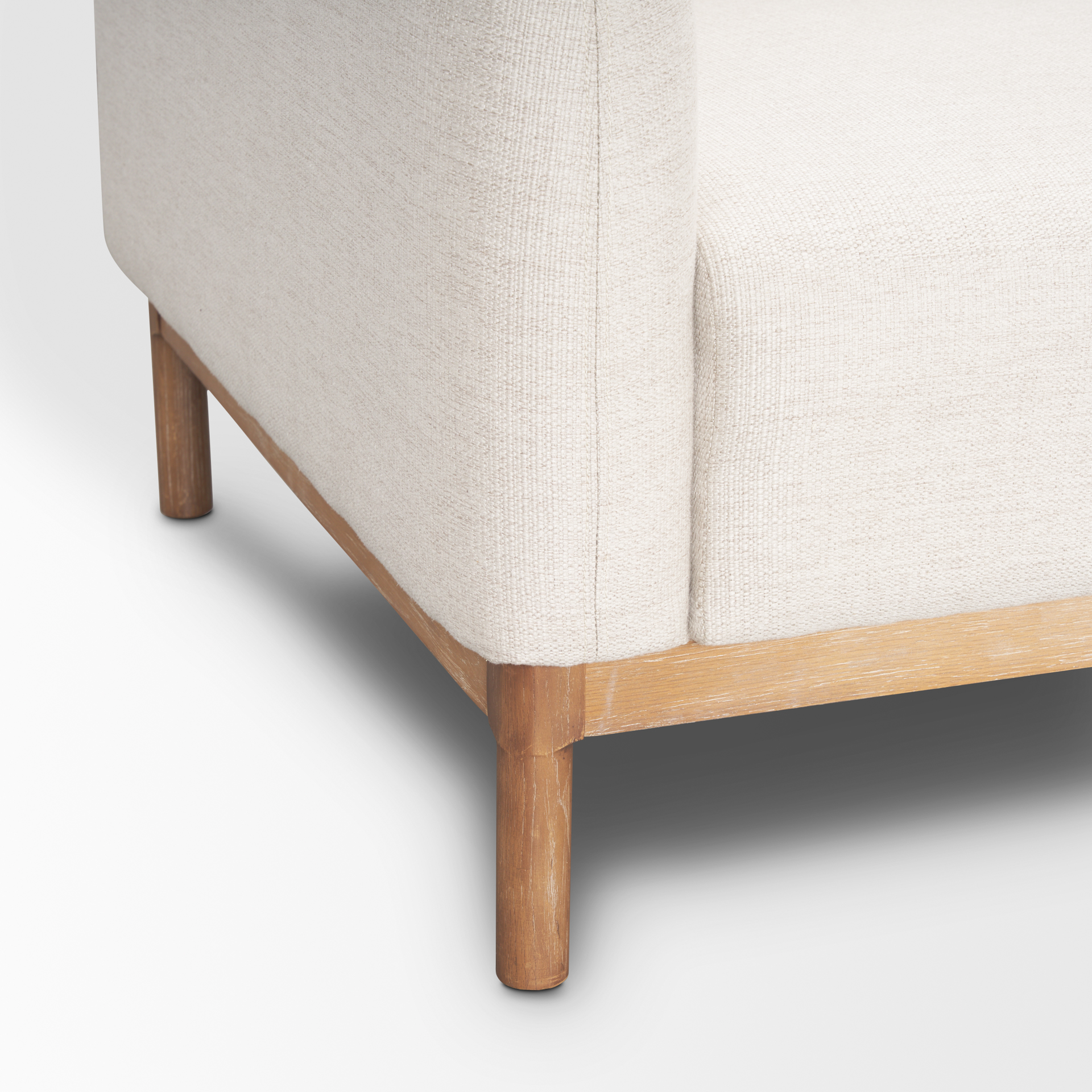 hale sofa w/ medium brown wood and oatmeal fabric