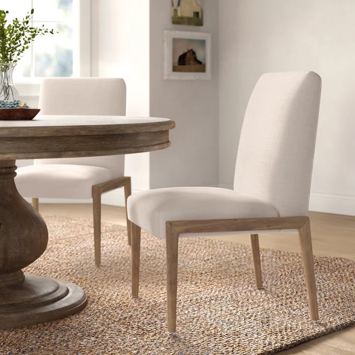 palisades cream upholstery w/ solid wood armless dining chair
