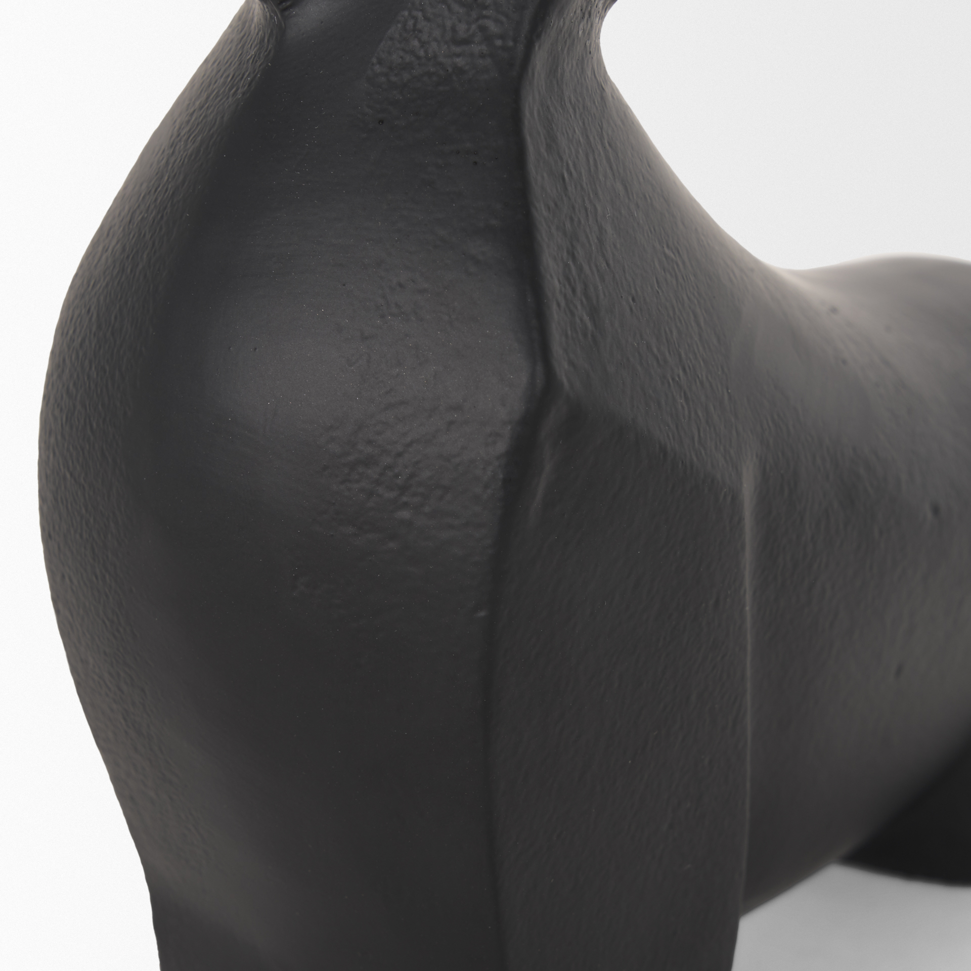 radu small matte black metal bull decorative object
