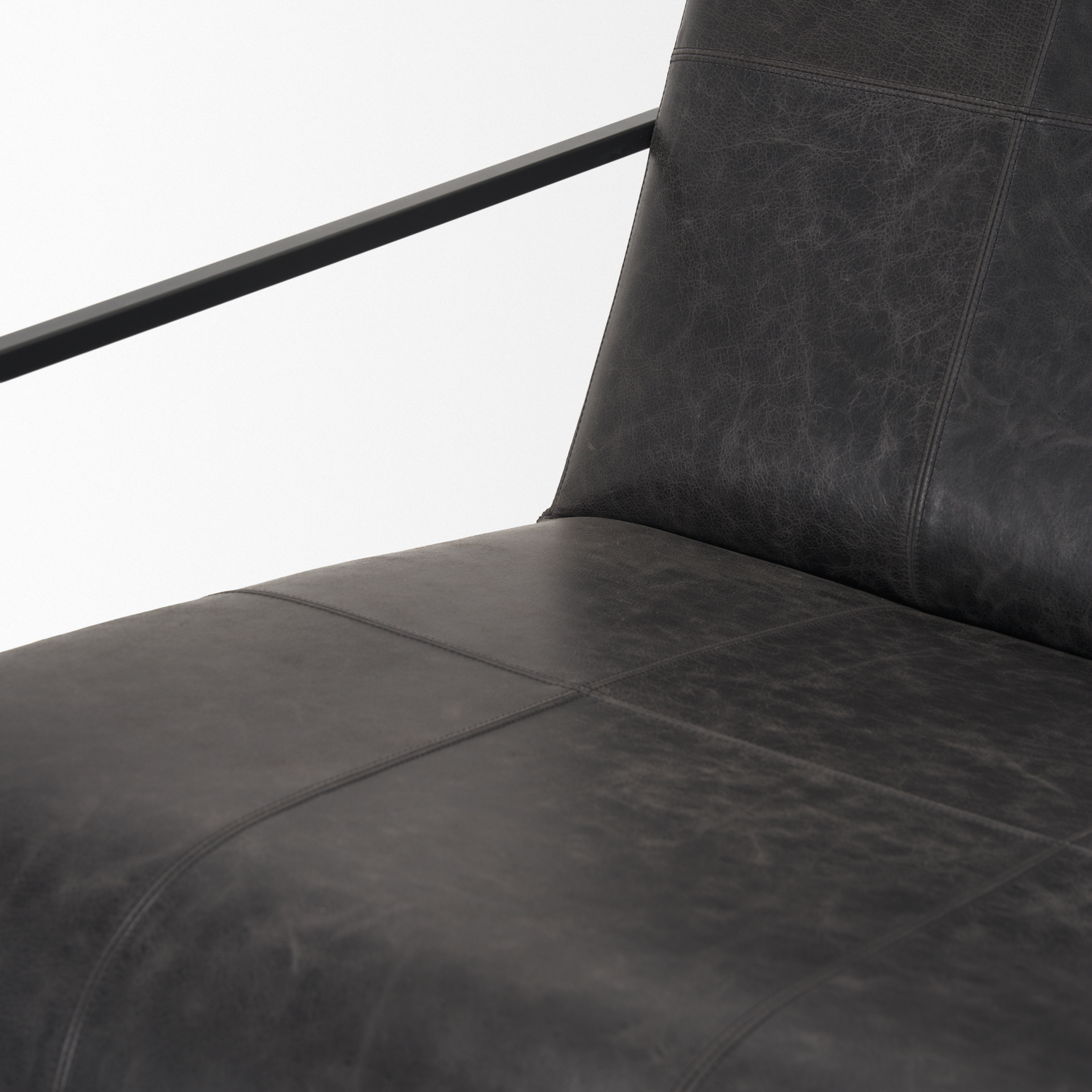 stratton gunmetal w/ genuine aged black leather upholstered accent chair