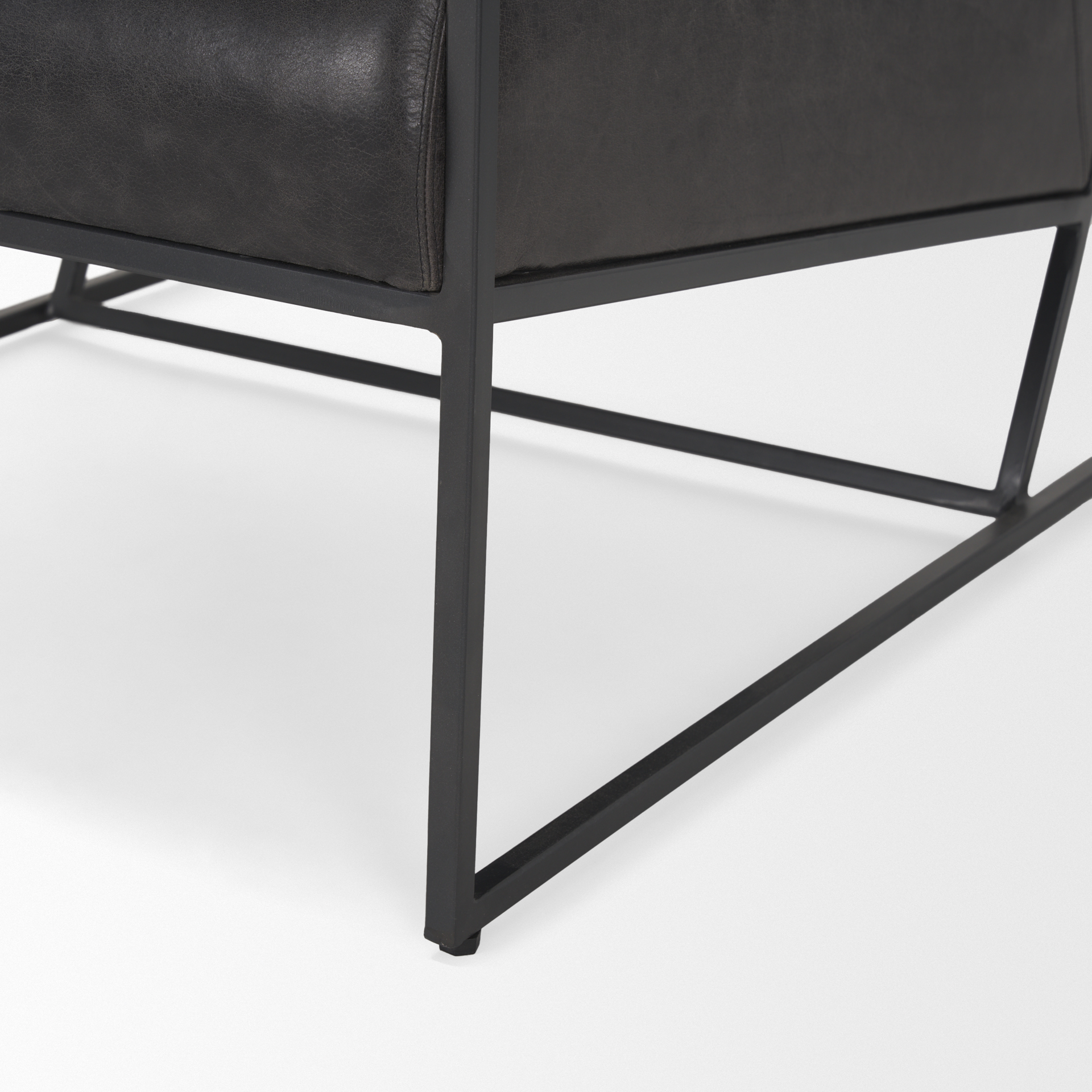 stratton gunmetal w/ genuine aged black leather upholstered accent chair