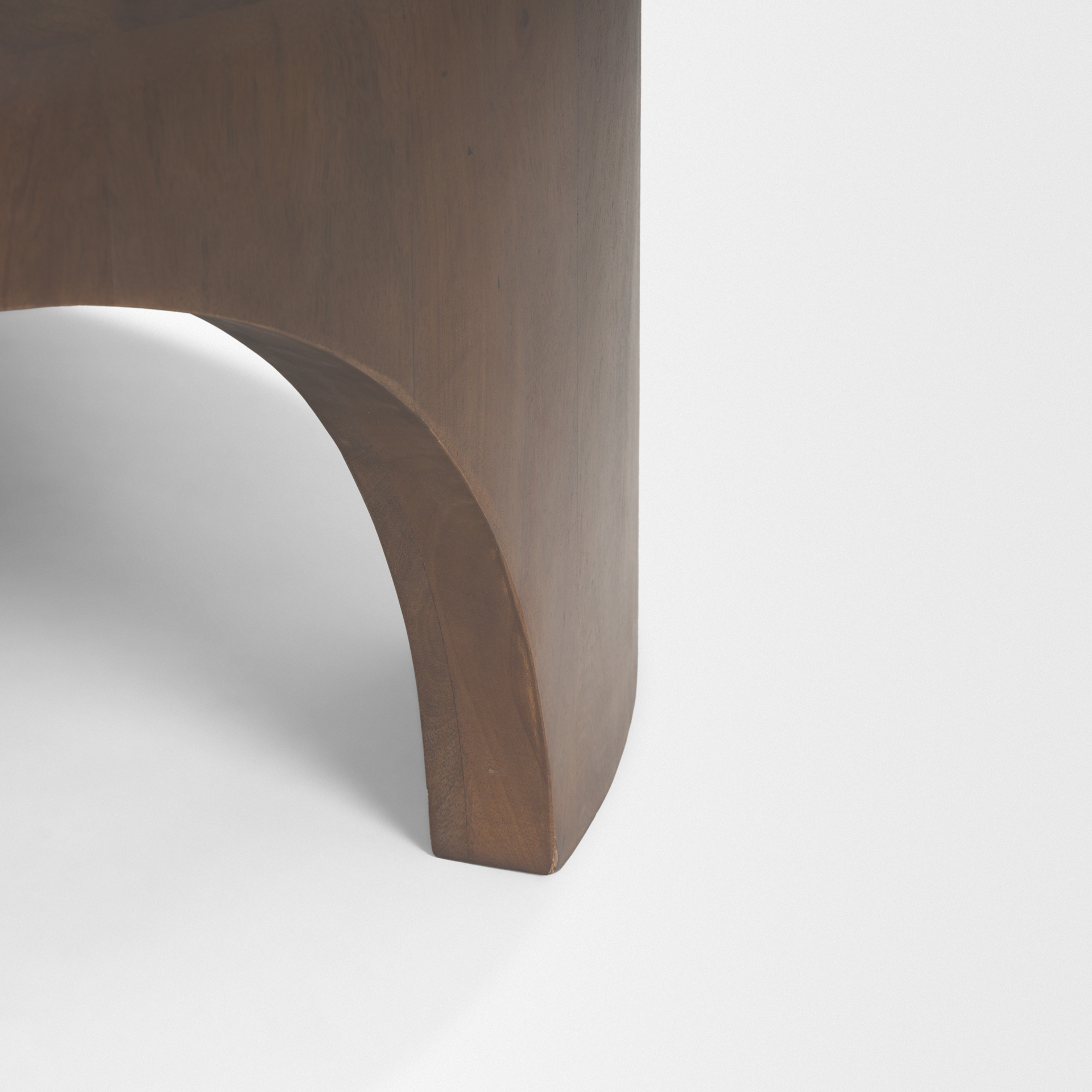 shima round dark brown wood w/arched legs coffee table