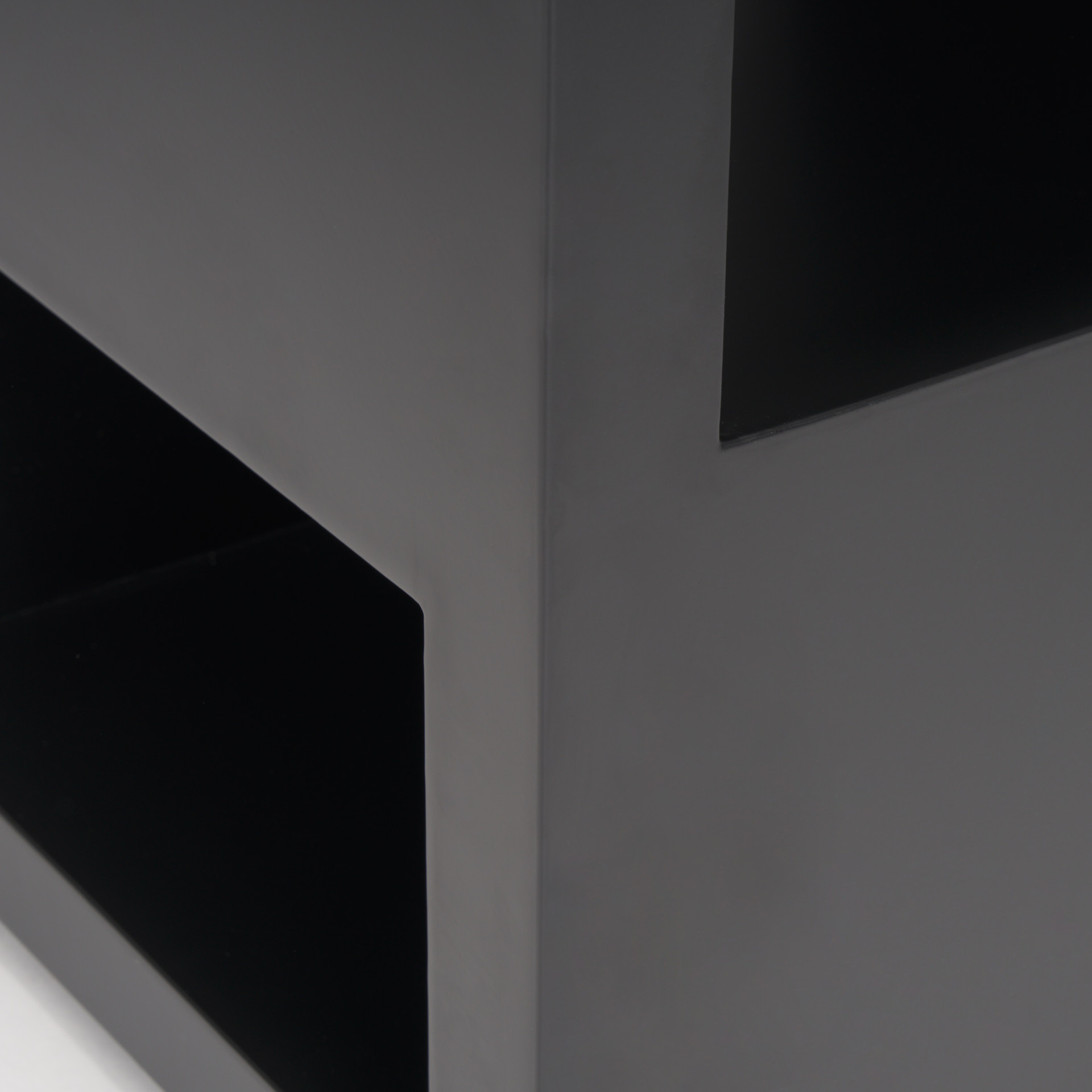 vondra matte black metal w/ open shelves side table