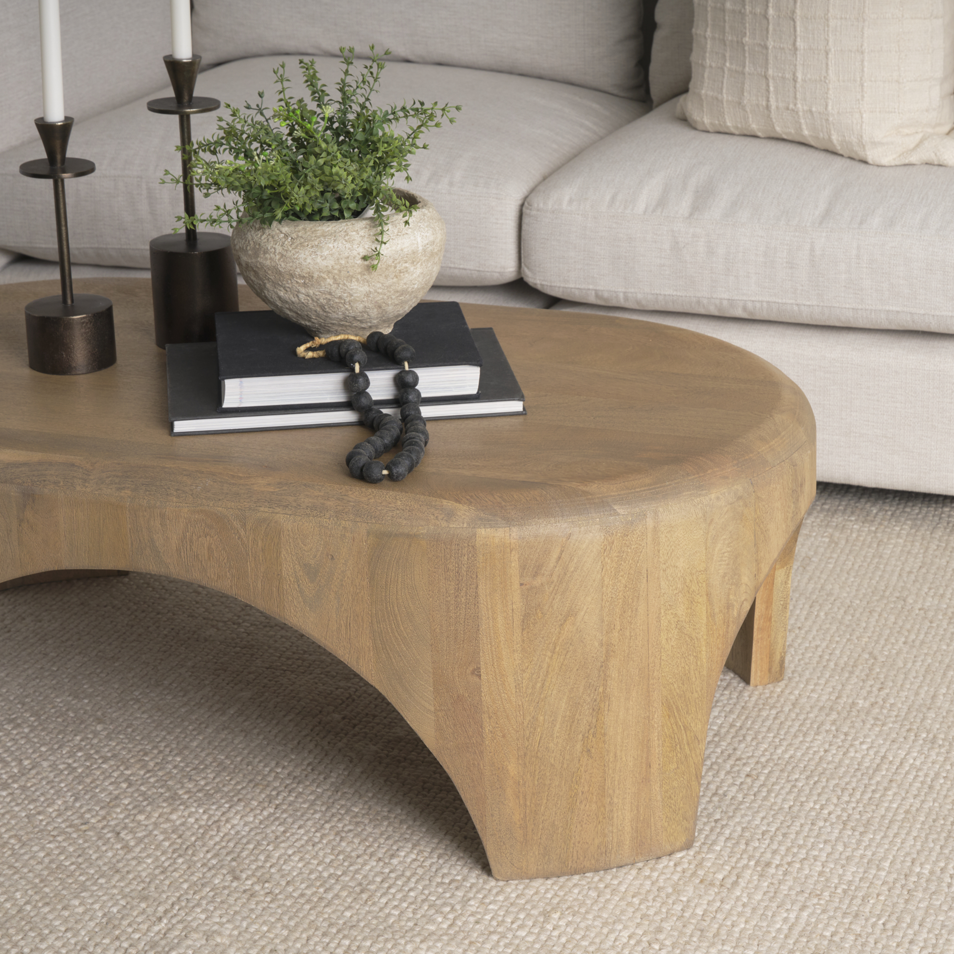 shima oval light brown wood w/ arched legs coffee table