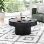 Sleek Black Mango Wood Round Coffee Table with Rubber Feet 6 Sleek Black Mango Wood Round Coffee Table with Rubber Feet