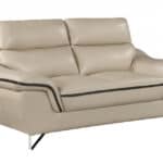 69 Inch Beige and Silver Faux Leather Love Seat with Pillow Arms