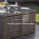 11 Piece Gray Glass Outdoor Dining Set with Wicker Base