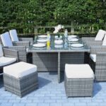 11 Piece Gray Glass Outdoor Dining Set with Wicker Base