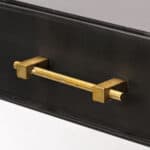 Black Writing Desk With Three Drawers and Gold Accents