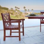 Brown Patio Armchair with Decorative Back and Natural Wood Finish