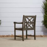 Distressed Outdoor Armchair With Decorative Back and Armrests