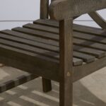 Distressed Outdoor Armchair With Decorative Back and Armrests