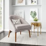Gray Tufted Accent Chair with Curved Silhouette and Wood Legs