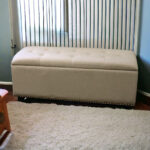 17" Beige and Black Upholstered Microfiber Flip Top Storage Bench