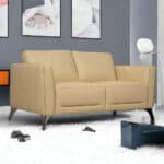 Cream Leather Loveseat with Black Legs and Track Arms