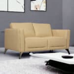 Cream Leather Loveseat with Black Legs and Track Arms