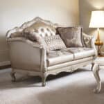 Pearl Faux Leather Curved Loveseat with Toss Pillows