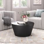 Black Round Coffee Table with Geometric Design and Rubber Feet