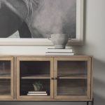 Arelius 70L x 18W x 32H Light Brown Wood, Black Metal Base w/ 4 Glass Cabinet Doors Sideboard