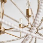 Ava White (34"D) Gold Metal and White Wood Beaded Six Bulb Chandelier