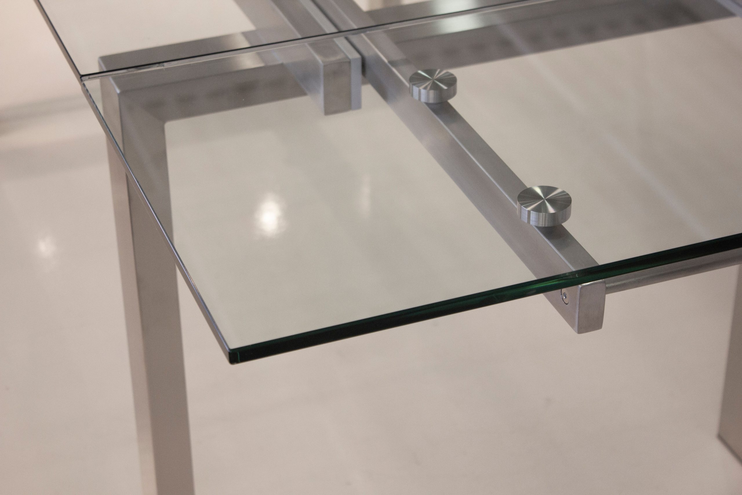 CANTRO Clear Tempered Glass Brushed Stainless Steel Extension Dining Table 2 CANTRO Clear Tempered Glass Brushed Stainless Steel Extension Dining Table - Image 2