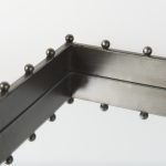 Elio 29.9L x 13.0W x 2.6H Gun Metal Gray Metal W/Studs and Mirrored Bottom Rectangle Tray
