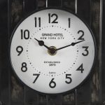 Karl 6.0L x 3.0W x 6.8H Rustic Black Iron Rounded Square Table Clock