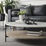 Larkin 48" Oval White Marble Top and Solid Wood Shelf w/ Black Metal Frame Coffee Table