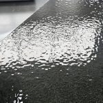 PONZA Black Modern Melt Glass Oval Dining Table