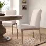 Palisades Cream Upholstery w/ Solid Wood Armless Dining Chair