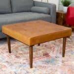 Tan Leather Mid-Century Tufted Ottoman with Solid Wood Legs 5 Tan Leather Mid-Century Tufted Ottoman with Solid Wood Legs
