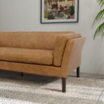 Tan Leather Sofa with Walnut Legs and Compact Design
