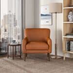 Tan Leather Mid-Century Modern Lounge Chair With Tapered Walnut Legs and Round Arms