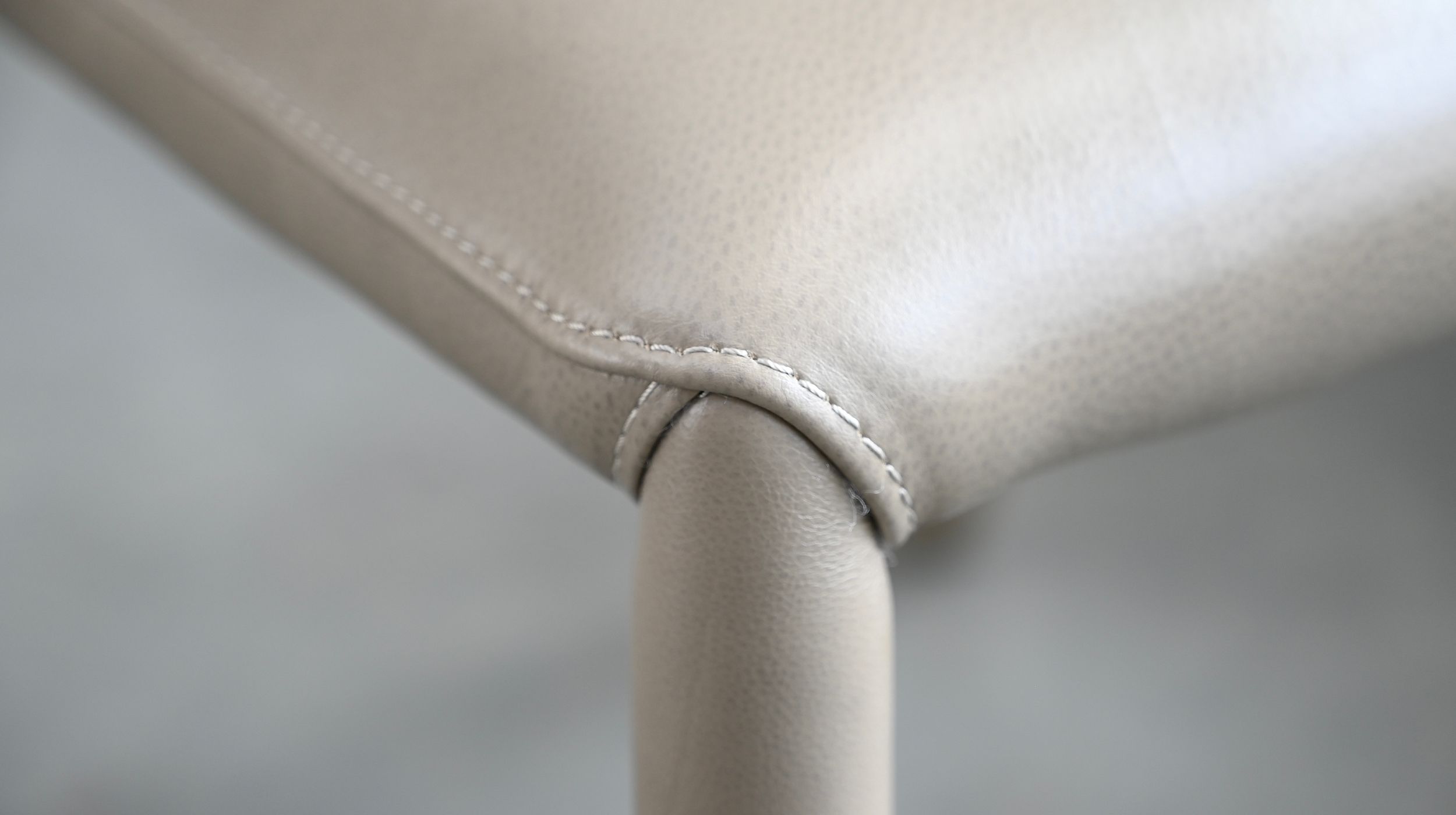 bosco taupe pebbled leather dining chair with metal